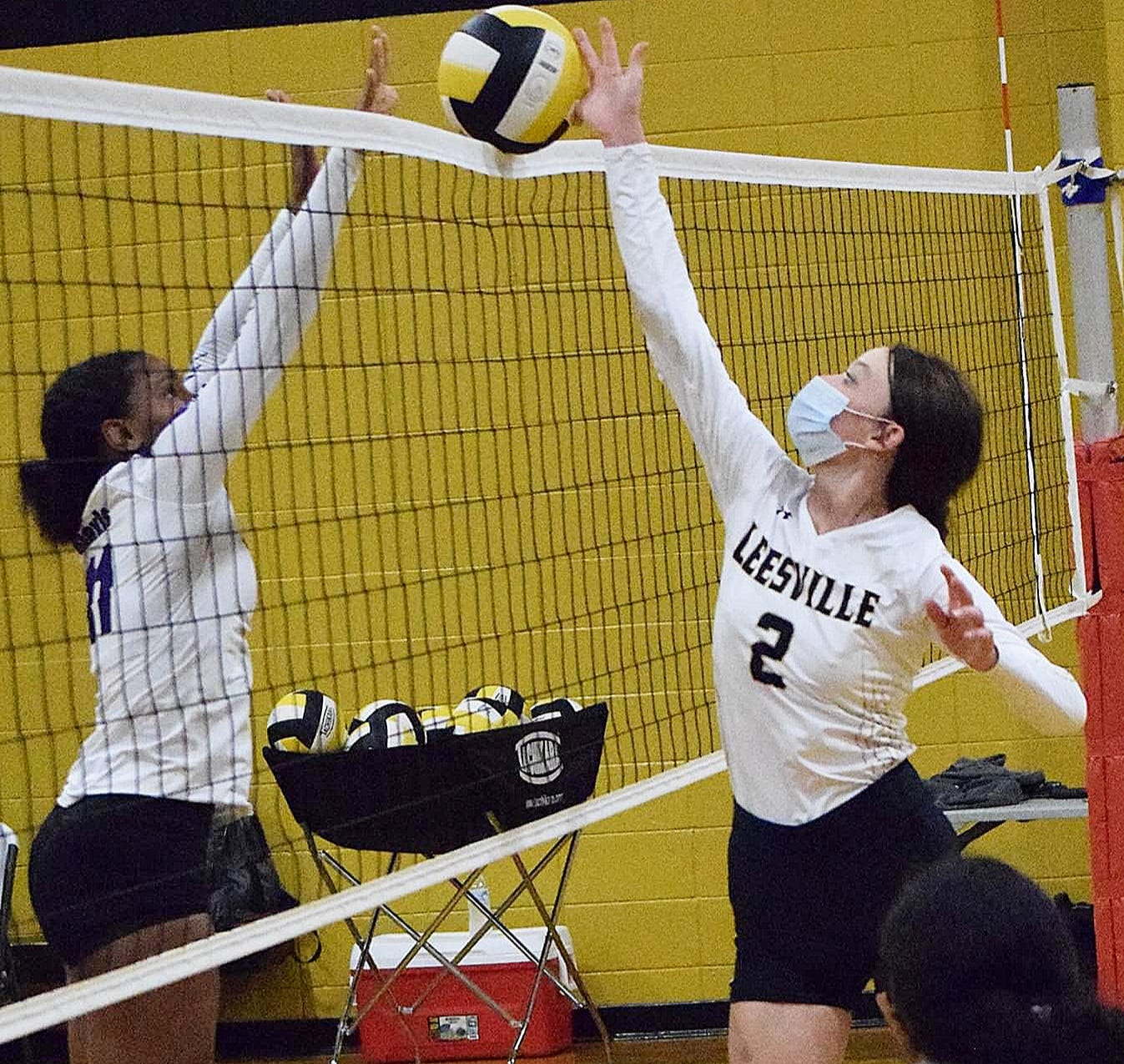 Leesville middle blocker Emily Willis (2), seen here in a match from earlier this season, was dominant at the net Thursday night in the Lady Cats' five-set district loss to Opelousas.